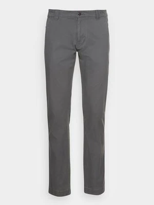 Spodnie materiałowe Tommy Jeans