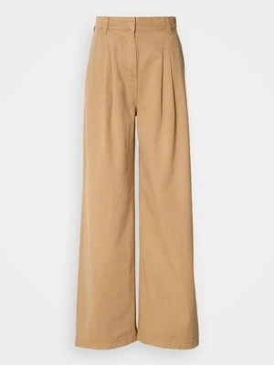 Spodnie materiałowe Tommy Jeans wielbłądzi