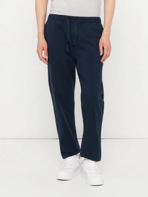 Spodnie materiałowe Tommy Jeans granatowy