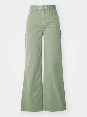 Spodnie materiałowe Tommy Jeans zielony