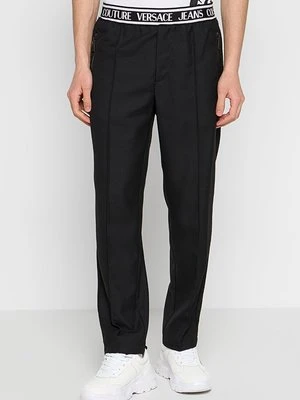 Spodnie materiałowe Versace Jeans Couture