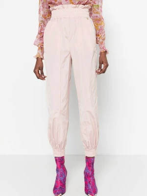 Spodnie materiałowe Versace Jeans Couture jasnoróżowy