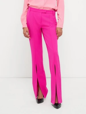 Spodnie materiałowe Versace Jeans Couture mleczny