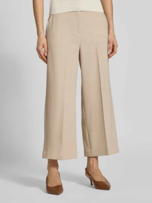 Spodnie materiałowe o kroju relaxed fit z dodatkiem wiskozy i kantami comma