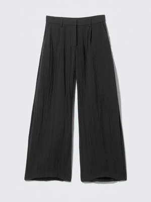 Spodnie materiałowe Weekday