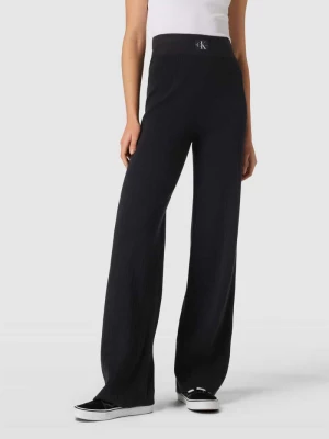 Spodnie materiałowe z drobnym prążkowaniem model ‘VARIEGATED’ Calvin Klein Jeans