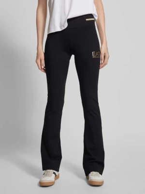Spodnie materiałowe z poszerzaną nogawką i nadrukiem z logo model ‘TRAIN CORE LADY’ EA7 Emporio Armani