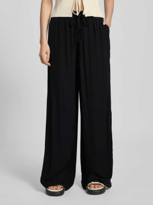 Spodnie materiałowe z szeroką nogawką i tunelem REVIEW