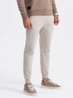 Spodnie męskie dresowe typu jogger - jasnobeżowe V1 OM-PABS-0173
 -                                    L