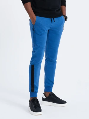 Spodnie męskie dresowe z przeszyciami - niebieskie V8 OM-PASK-0137
 -                                    XXL Ombre