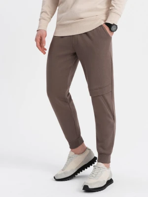 Spodnie męskie dresowe z przeszyciem i zamkiem na nogawce - brązowe V4 - Rozmiar: S Ombre Clothing