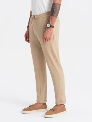 Spodnie męskie dzianinowe z gumką w pasie - piaskowe V3 OM-PACP-0121
 -                                    L