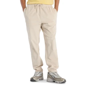 Spodnie męskie New Balance MP53521TWF - beżowe