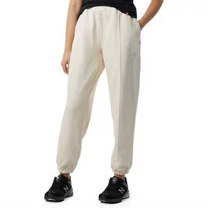 Spodnie New Balance WP23553GIE - beżowe