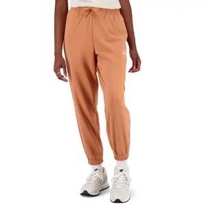 Spodnie New Balance WP31508SEI - pomarańczowe