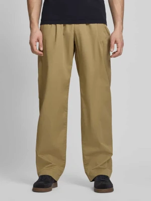 Spodnie o kroju loose fit z zakładkami w pasie Tommy Hilfiger