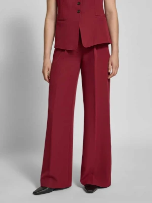 Spodnie o kroju regular fit z szeroką nogawką Boss Orange