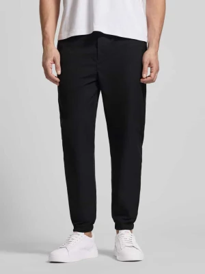 Spodnie o kroju slim fit o luźnym kroju z kieszeń z tyłu CK Calvin Klein