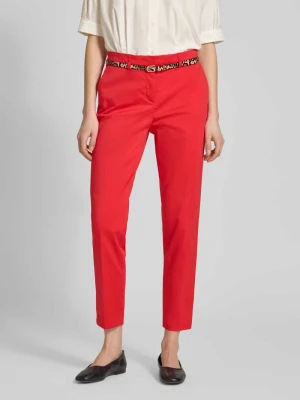 Spodnie o kroju slim fit w skróconym kroju z paskiem Christian Berg Woman