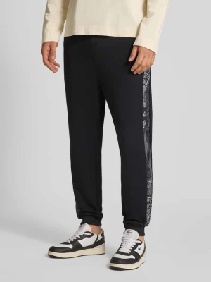 Spodnie o kroju slim fit z kieszeniami z tyłu carlo colucci