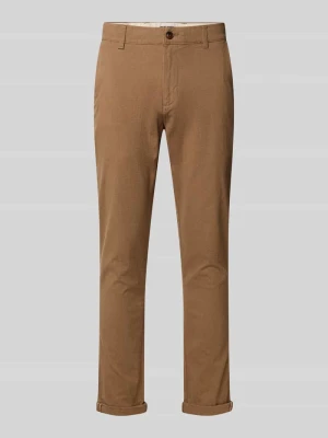 Spodnie o kroju slim fit z wpuszczanymi kieszeniami model ‘MARCO’ jack & jones