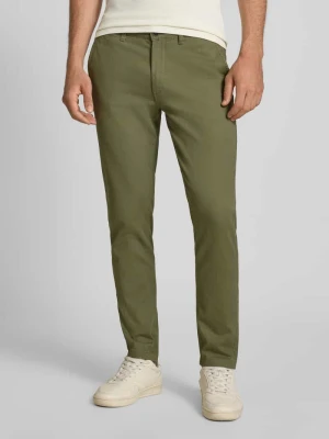 Spodnie o kroju slim fit z wpuszczanymi kieszeniami model ‘MARCO’ jack & jones