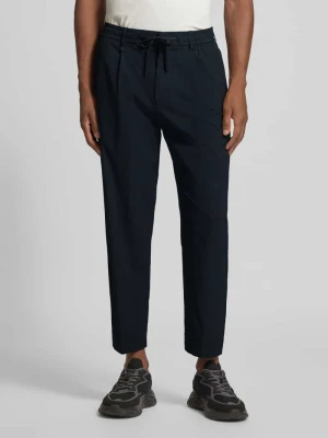 Spodnie o kroju tapered fit z tunelem model ‘CONVERT PLEAT’ BOSS Green