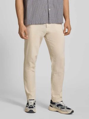 Spodnie o kroju tapered fit z wpuszczanymi kieszeniami model 'STACE' jack & jones