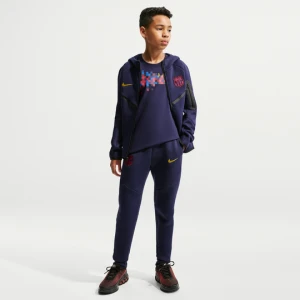 Spodnie piłkarskie dla dużych dzieci (chłopców) Nike FC Barcelona Tech Fleece - Niebieski