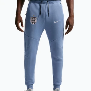 Spodnie piłkarskie męskie Nike England Tech Fleece Soccer Joggers work blue/white