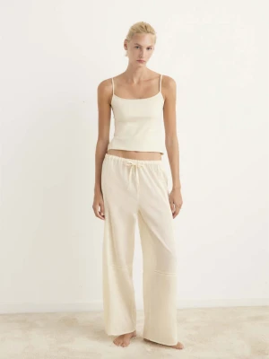 Spodnie piżamowe z bawełny z koronką i plisami waniliowy - Kobieta - - MANGO