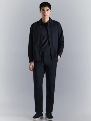 Spodnie slim fit water-repellent granatowy - Mężczyzna - - MANGO MAN