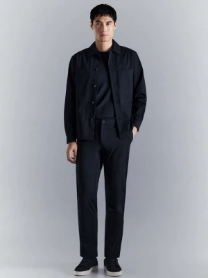 Spodnie slim fit water-repellent granatowy - Mężczyzna - - MANGO MAN