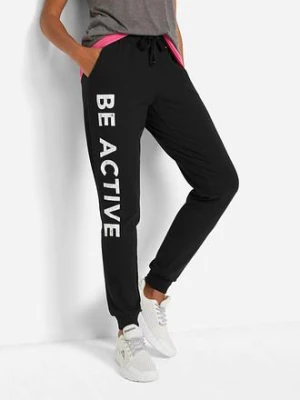 Spodnie sportowe bawełniane z nadrukiem, Loose Fit bonprix