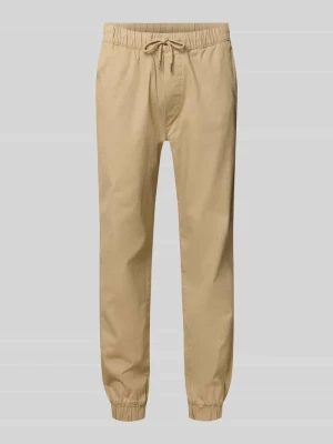 Spodnie sportowe o kroju regular fit z elastycznym pasem model ‘GORDON’ jack & jones