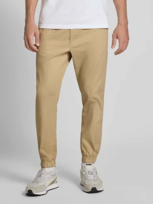 Spodnie sportowe o kroju regular fit z elastycznym pasem model ‘GORDON’ jack & jones