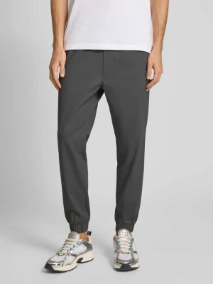 Spodnie sportowe o kroju regular fit z elastycznym pasem model ‘GORDON’ jack & jones