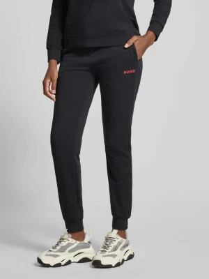 Spodnie sportowe o kroju regular fit z mieszanki bawełny HUGO