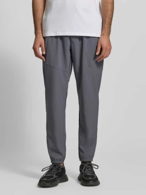 Spodnie sportowe o kroju regular fit z nadrukiem z logo model ‘Vibe’ Under Armour