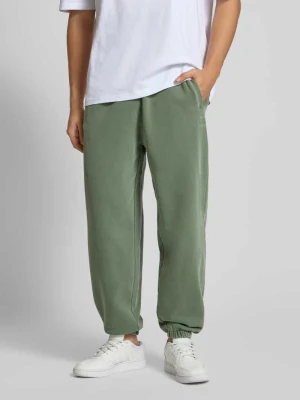 Spodnie sportowe o kroju relaxed fit z elastycznym pasem model ‘Shield’ DEUS EX MACHINA