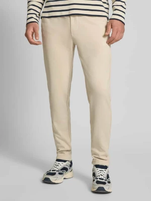Spodnie sportowe o kroju relaxed fit z lekko fakturowanym wzorem model ‘NEWKODYL’ Only & Sons