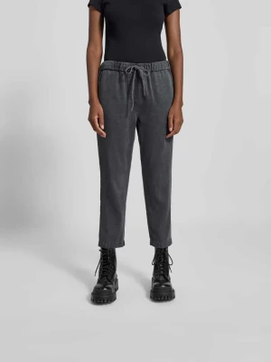 Spodnie sportowe o kroju relaxed fit z tunelem Juvia Czarny