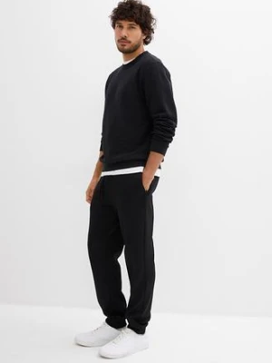 Spodnie sportowe ocieplane, z kieszeniami zapinanymi na zamek bonprix