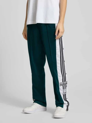 Spodnie sportowe z bocznymi guzikami model ‘ADIBREAK’ adidas Originals