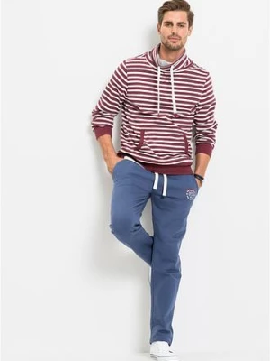 Spodnie sportowe z czystej bawełny, ze sportowymi detalami bonprix