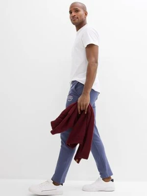 Spodnie sportowe z czystej bawełny, ze sportowymi detalami bonprix