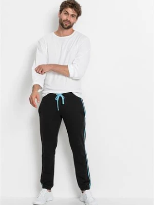 Spodnie sportowe z kontrastowymi elementami bonprix