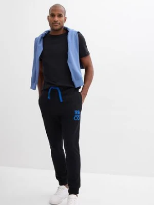 Spodnie sportowe z kontrastowymi elementami bonprix