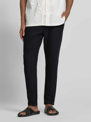 Spodnie sportowe z mieszanki bawełny i lnu z elastycznym pasem Scotch & Soda