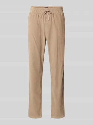 Spodnie sztruksowe o kroju tapered fit z czystej bawełny model ‘ISAAC’ Tommy Jeans